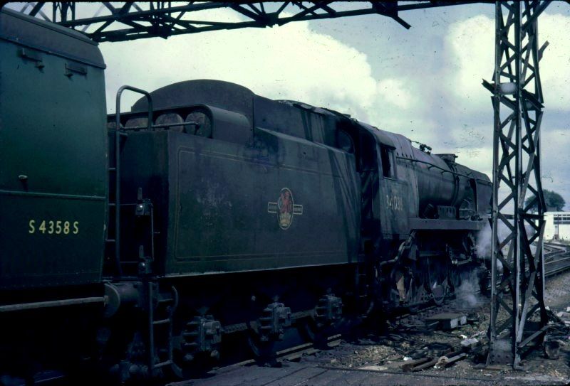 O. V. Bullied 34036 WESTWARD HO! at Basingstoke Station with an express passenger train bound for Waterloo from the West Country, Exeter and Plymouth (pictured in July 1967)
