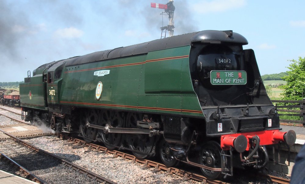 4-6-2 light Pacific Battle of Britain Class steam locomotive 34072 257 SQUADRON carry headboard entitled THE MAN OF KENT on the Kent and East Sussex Railway Steam Gala 2023, a visitor from Spa Valley Railway  (photo courtesy of Kentish Bob YouTube https://www.youtube.com/@kentishbob6423 )