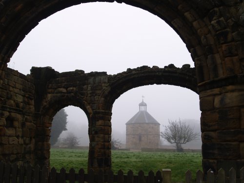 The dovecot in the ruins of Guisborough Priory on a misty morning.