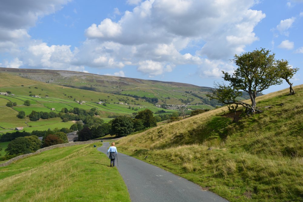 road from Heugh down to Satron Muker Oxnop Satron Ivelet Bridge circular walk, Swaledale, Yorkshire Dales National Park, North Yorkshire, England