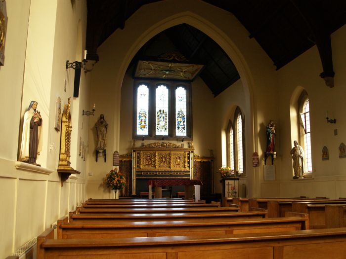 The sanctuary-chancel was remodelled in 1957 by Dom Damian Webb of Ampleforth.