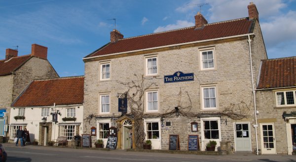 The Feathers, a modern hotel in an old country house, in the main market square of Helmsley. It extends into Thorpe's cottage on the left, one of Helmsley's oldest buildings.