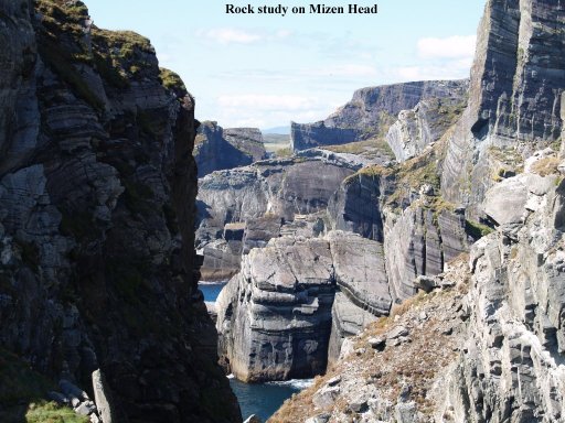 The spectacular rock formations at Mizen Head looking north from the bridge to the lighthouse