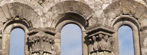 Details of the top carvings of the east window. - St Fachtnan's Cathedral & Crosses, Kilfenora, The Burren, County Clare, West of Ireland