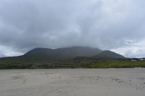 Walking on Silver Strand beach beneath Mweelrea mountain Co. Mayo Walking on Silver Strand beach beneath Mweelrea mountain Co. Mayo