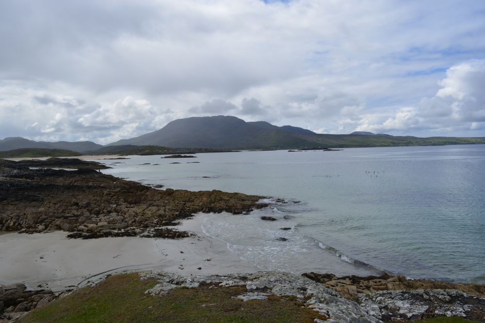Walking on Silver Strand beach beneath Mweelrea mountain Co. Mayo Walking on Silver Strand beach beneath Mweelrea mountain Co. Mayo