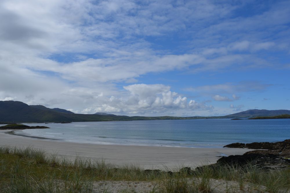 Walking on Silver Strand beach beneath Mweelrea mountain Co. Mayo Walking on Silver Strand beach beneath Mweelrea mountain Co. Mayo