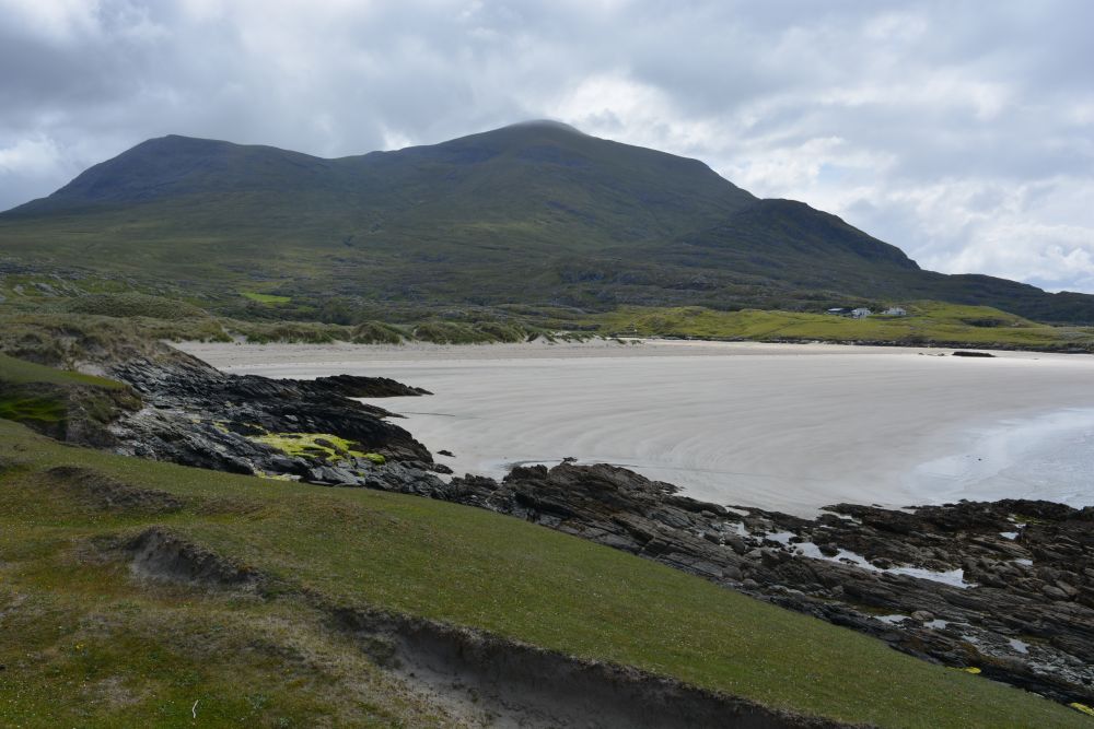 Walking on Silver Strand beach beneath Mweelrea mountain Co. Mayo Walking on Silver Strand beach beneath Mweelrea mountain Co. Mayo