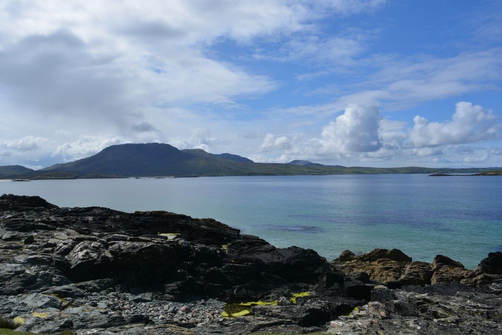 Walking on Silver Strand beach beneath Mweelrea mountain Co. Mayo Walking on Silver Strand beach beneath Mweelrea mountain Co. Mayo
