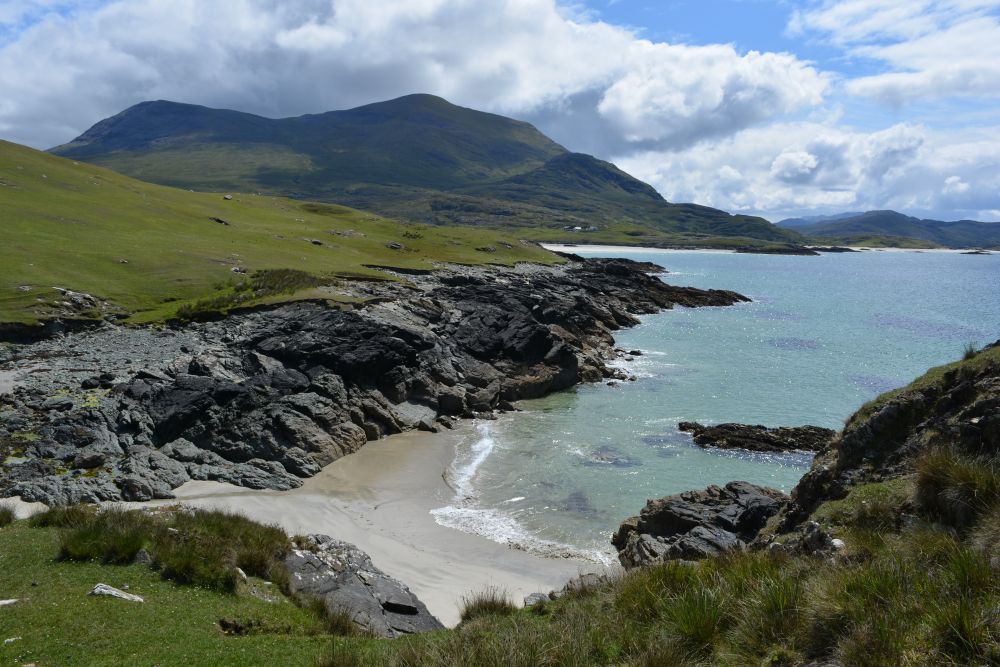 Walking on Silver Strand beach beneath Mweelrea mountain Co. Mayo Walking on Silver Strand beach beneath Mweelrea mountain Co. Mayo