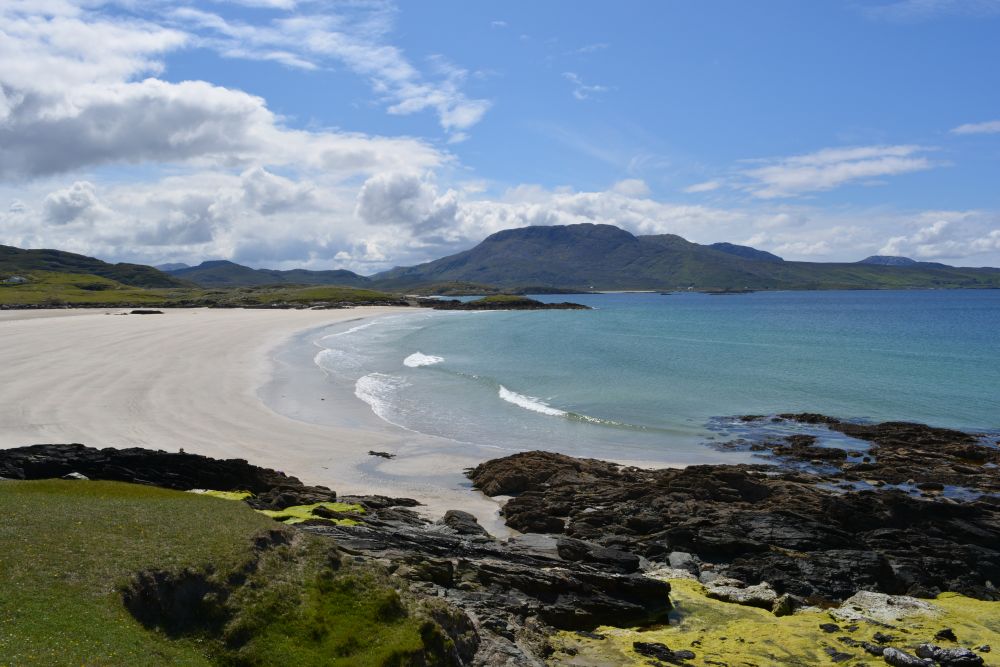 Walking on Silver Strand beach beneath Mweelrea mountain Co. Mayo Walking on Silver Strand beach beneath Mweelrea mountain Co. Mayo