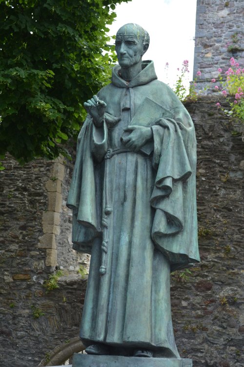 The commemorative statue to the scholar and priest Father Luke Wadding 1588 - 1657 Waterford city, Ireland