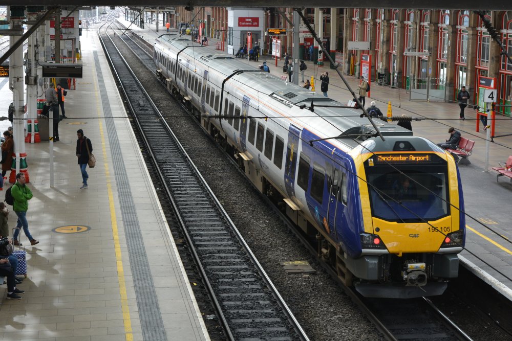 Class 195 DMU Preston station Northern Rail service from Windermere to Manchester Airport