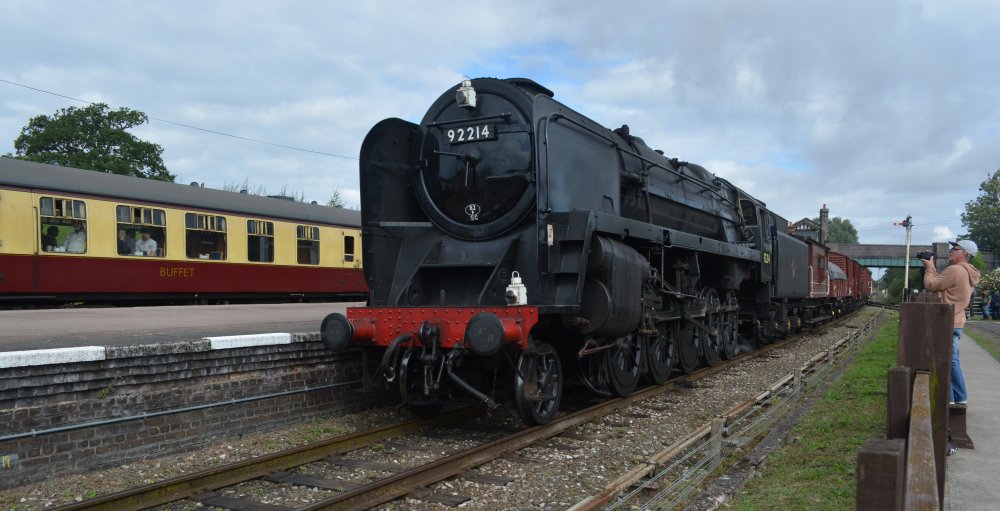 Ex BR Standard steam locomotive 92214 passing south through Quorn and Woodhouse station with a demonstration freight train, Great Central Railway heritage weekend Gala 'Railways at Work' (GCR August 2023)