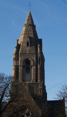 The spire of St Andrew's Church dominates the landscape. St Andrews Church was built in 1871 in the 'spirit' of the Gothic Revival architectural movement. - City of Nottingham, England, English Midlands