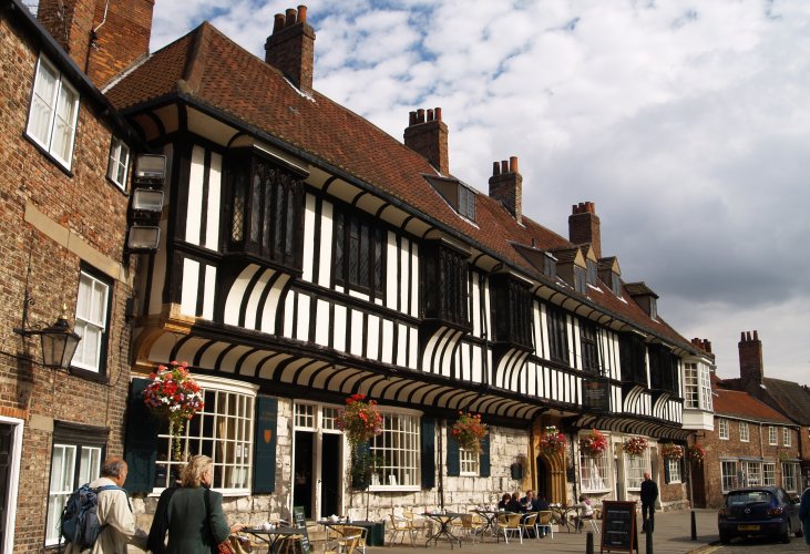 58. York, The handsome Medieval-Tudor building of St William's College, College Street, near York Minster.