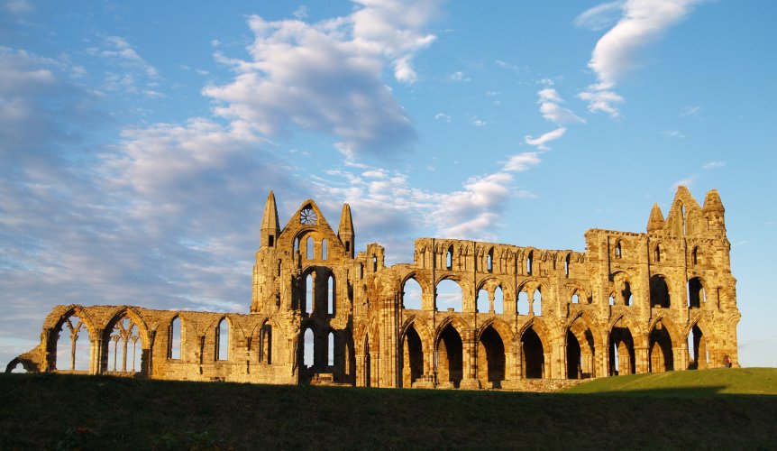 63. The weather beaten ruins of the medieval Whitby Abbey (1) high on the cliffs at Whitby on the North Sea Coast of North Yorkshire.