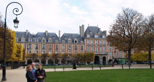 The Place des Voges is the oldest large square in Paris. The central building is the Queen's Pavilion.