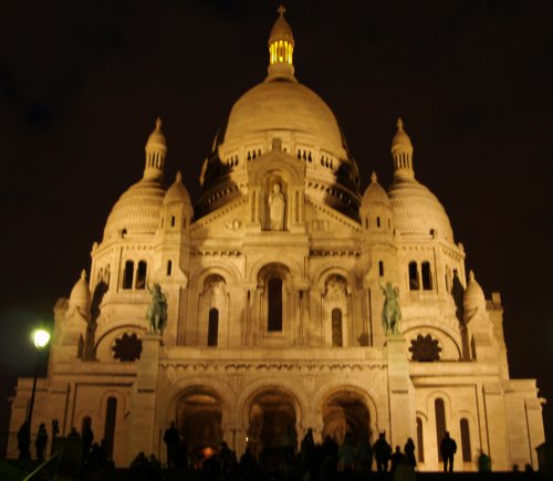 Sacre-Coeur floodlit at night. Quite a stunning sight under the floodlights!