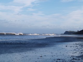 Breakers crashing on the beach - Sandsend, on the coast near Whitby, North Yorkshire