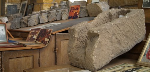 Perhaps a baby's Saxon coffin, with odd decorated carved stones from earlier buildings.
