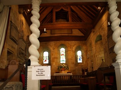 Looking through the chancel arch to the alter. Parts of the chancel date back to early medieval times.