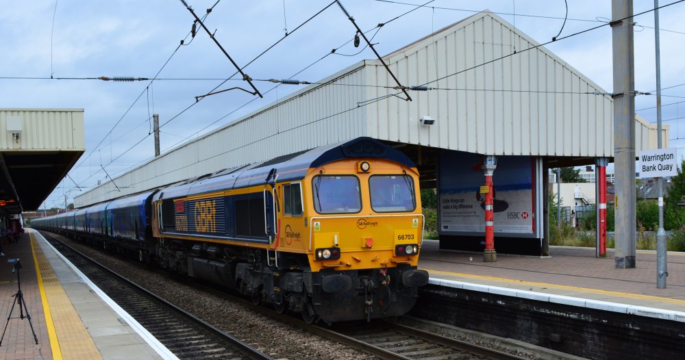Trainspotting at Warrington Bank Quay station A Class 66 diesel locomotive hauling a Bio-Mass train from Liverpool Docks to Drax power station