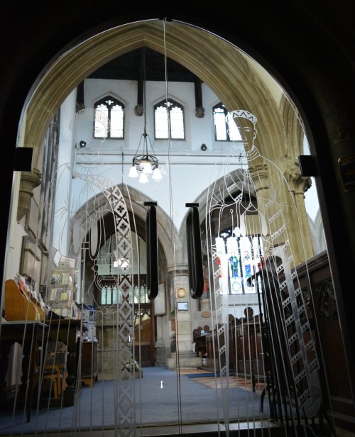 glass door entrance to All Saints Church Stamford, Lincolnshire
