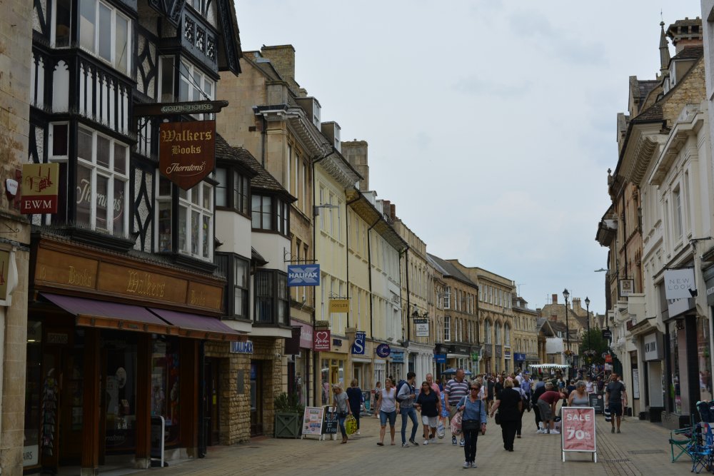 general view of the shops and cafes in High Street Stamford, Lincolnshire