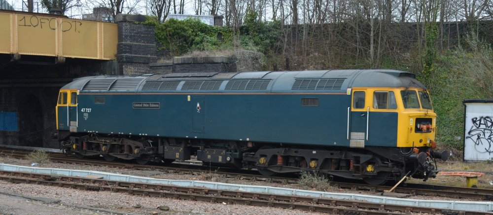 Class 47 diesel-electric locomotive sub-class 47/7 47727 named Caisteal Dhun Eideann and Edinburgh Castle on the move from the depot yard of UK Rail Leasing Leicester February 2023