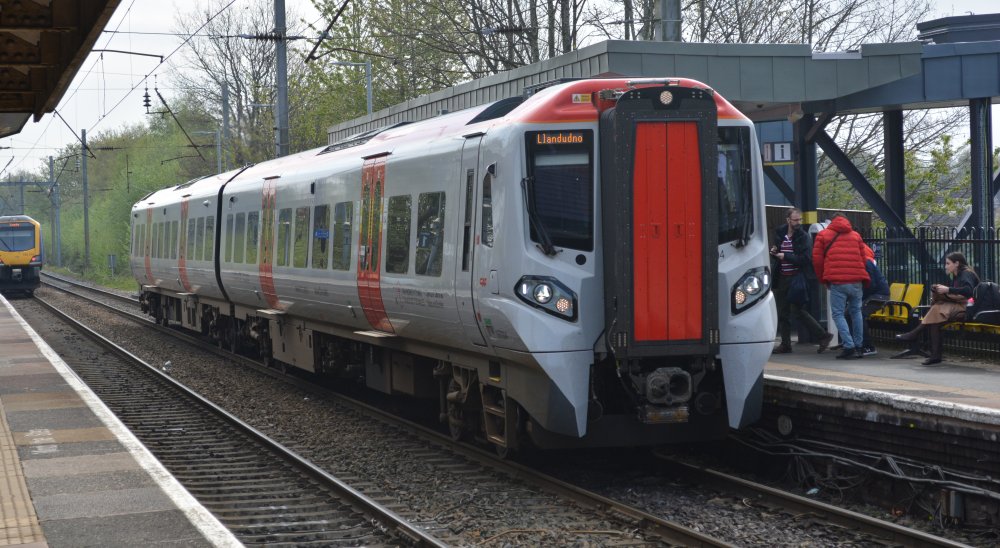 A CAF built Class 197 DMU unit 197004 at Newton-le-Willows station with Transport for Wales (TfW) service from Manchester to Llandudno (April 2023)