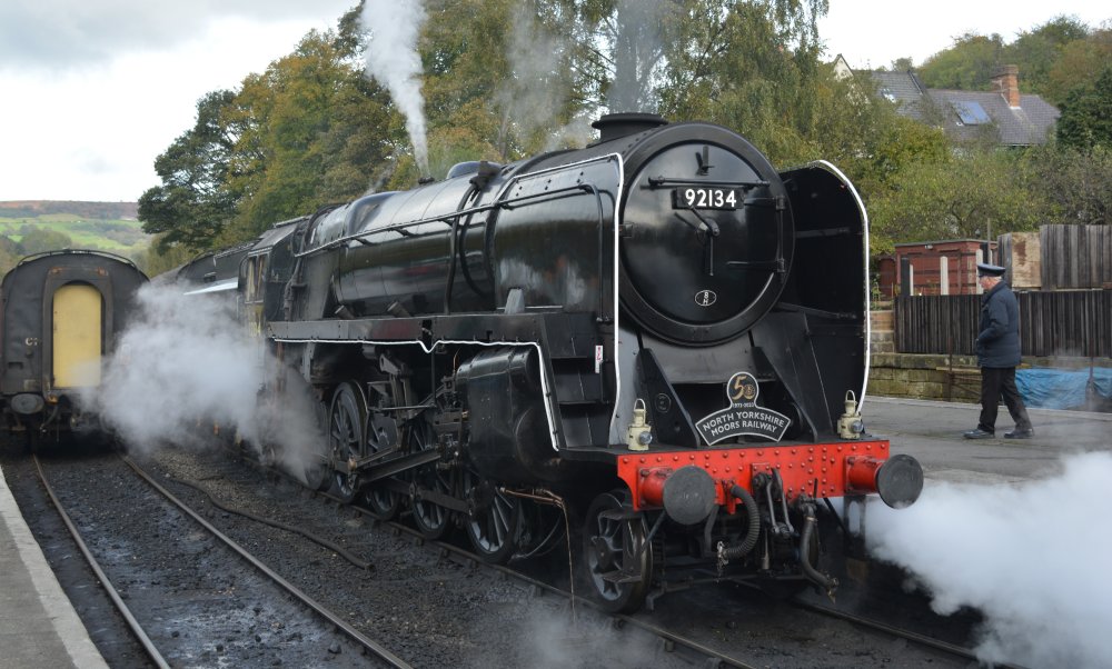 British Railway 9F 2-10-0 freight steam locomotive standing in Grosmont Station on the NYMR (Oct. 2023)